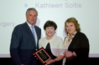 Margarita L. Dubocovich, PhD (right), and Michael E. Cain, MD, presented Kim Griswold, MD, with an Excellence Through Inclusion and Cultural Enhancement Award.