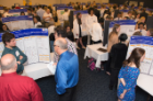 High school students exhibited scientific posters describing their studies of online gene annotation. The event was part of a UB project that aims to inspire them to pursue careers in the science, technology, engineering and math fields.
