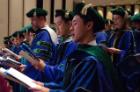 Allen Chung and his fellow classmates recite the Charge of Maimonides during the 170th annual commencement of the Jacobs School of Medicine and Biomedical Sciences.
