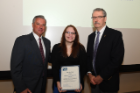 Richard T. Cheney, MD (right), and Michael E. Cain, MD, presented the Anthony Postoloff Scholarship Award in Pathology to Tara Hogan (center), who intends to pursue a career in pathology.