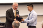 John E. Tomaszewski, MD, presents the Kornel Terplan Award to Charles Zhang, Class of 2020. The award goes to the student with the highest average in pathology.