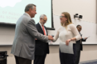 Natalia Crenesse-Cozien is congratulated by Michael E. Cain, MD, after receiving her Dean’s Letter of Commendation.