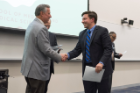 Thomas Fiorica is congratulated by Michael E. Cain, MD, after receiving his Dean’s Letter of Commendation.