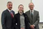 Emily Ellmann received the Edward L. Curvish, MD, Award for Excellence in Biochemistry. Presenting the award were Mark R. O’Brian, PhD, right, and Michael E. Cain, MD.