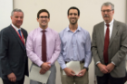 Andrew Fink, second from left, and Carl Hashem received the Kornel Terplan Award for the highest averages in pathology. Presenting the honor were Richard T. Cheney, MD, right, and Michael E. Cain, MD.