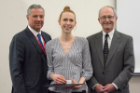 Rachel Knapp received the Edward L. Curvish, MD, Award for Excellence in Biochemistry. Presenting the award were Mark R. O’Brian, PhD, right, and Michael E. Cain, MD.