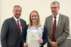Sarah Quinn received the Anthony Postoloff Scholarship Award in Pathology from Richard T. Cheney, MD, right, and Michael E. Cain, MD. The scholarship is awarded to a third-year student who intends to pursue a career in pathology.