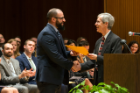 Award winner Russell John Pizzo, left, receives congratulations from Christopher S. Cohan, PhD. 
