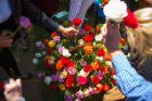 Family members were invited to take a rose from the floral arrangements. Photo: Douglas Levere