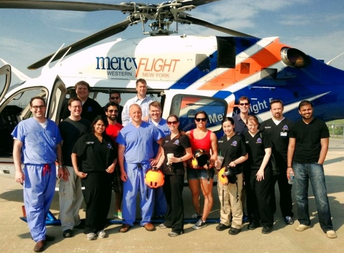 Residents and Mercy Flight helicopter. 