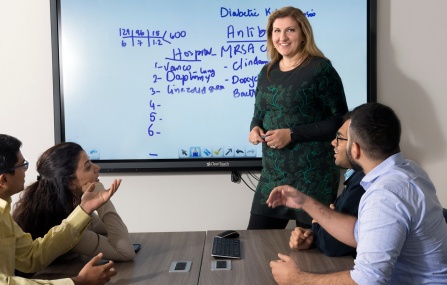 Residents participate in a conference.
