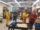 Dr. Dave Hostler and lab manager Lindsay, of the UB Emergency Responder Human Performance Lab, discuss medical concerns specific to firefighting.
