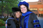 Charanya Kumar shares a celebratory moment with her mentor, Jennifer A. Surtees, PhD, of biochemistry.