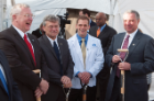 Dean Michael E. Cain, MD, (far right) prepares to break new ground with (from left) John Tomaszewski, MD, professor and chair of pathology and anatomical sciences; Provost Charles Zukoski; and medical student William Stendardi.