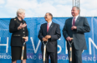 SUNY Chancellor Nancy Zimpher (left), UB President Satish K. Tripathi and Dean Michael E. Cain, MD, celebrate the beginning of a new chapter in UB’s history.
