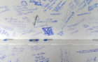 At a beam signing ceremony on March 16, 2016, medical students, residents, fellows, faculty and staff joined medical school alumni and donors to write messages and signatures on the 1-ton steel beam.