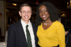 David Holmes, MD, congratulates Tonya Lemonious, who will be staying at UB for her residency in pediatrics.