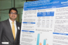 Internal medicine resident Nikhil Agrawal, MD, is pictured with his research poster presentation.