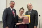 Her second-year classmates chose to give the Marek Zaleski Award to Alexandra Marrone, as the student who best combined Dr. Zaleski’s high standards of academic achievement with outstanding service to the community. At left is Michael E. Cain, MD. At right is Terry D. Connell, PhD.