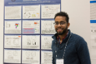 Mohamed Sharif and his poster, Selective Copii Vesicles Mediates Glycosylphosphatidylinositol (GPI)-dependent Trafficking In The Early Secretory Pathway Of Trypanosoma Brucei.