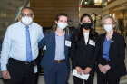 From left, David A. Milling, MD; Michelle Galindez; Gaby Cordero; and Allison Brashear, MD. Galindez and Cordero, both second-year students, shared first-place honors.