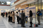 Medical students explain their research projects to colleagues and Jacobs School faculty members during the annual Medical Student Research Forum.