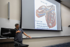 Gross anatomy instructor and associate professor John Kolega gestures to drive home a point about the shoulder’s complex anatomy.