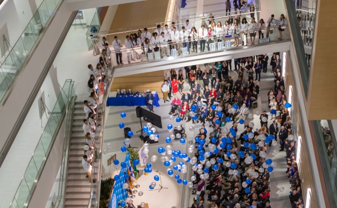 Balloons are dropped from the top of the atrium in the new building during the Inner Circle Reception. 