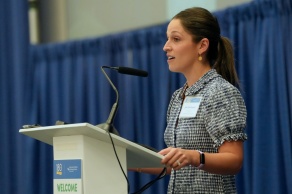 Dr. Donhauser speaking at a lectern. 