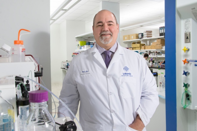 Mark D. Hicar MD, PhD in a lab. 