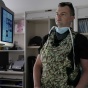 Thomas Suchy, MD looking at medical images. 