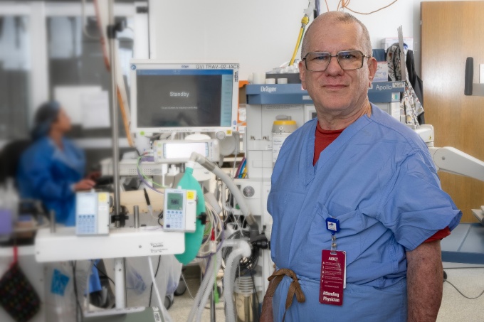 Dr. Stern is in a clinical setting. 