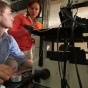 one of our faculty giving direction to a student in the biochemistry lab. 