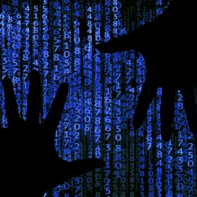 Hands are on the foreground of blue numbers.