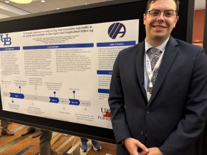 Dr. Young presenting his poster.
