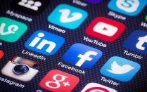 App logos of various social media sites, such as YouTube, Facebook, and Twitter. 