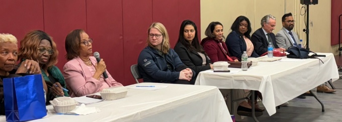 People sitting at two tables. 