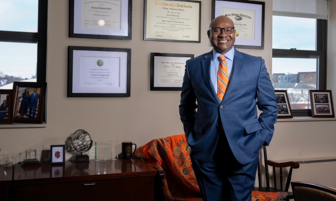 Leonard Egede, MD, stands in the Jacobs School.
