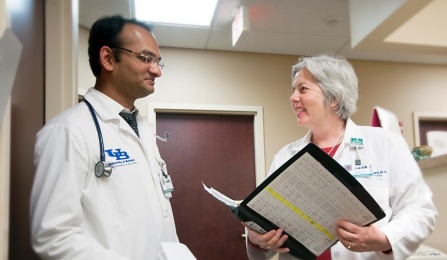 Rubin Bahuva, MD, with Paula Burkard MD, PhD. 