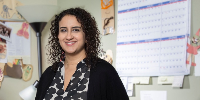 Sarah Abdelsayed, MD, stands in her office. 