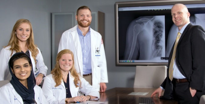 Thomas R. Duquin, MD, with medical students. 