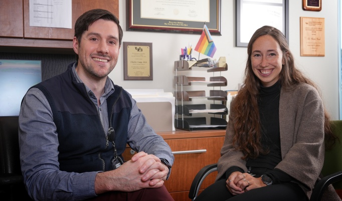 Drs. Camp and Burdo are in a medical setting. 