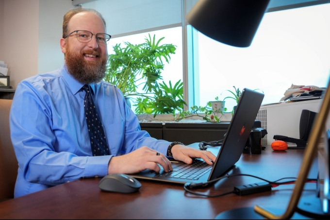 Corey Leidenfrost at his desk. 