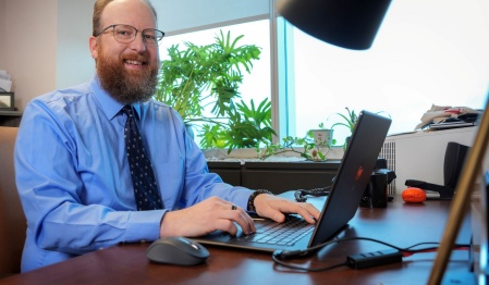 Corey Leidenfrost at his desk. 