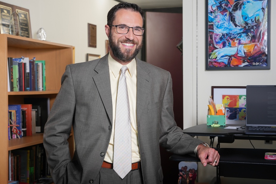 Michael DiGiacomo in an office. 