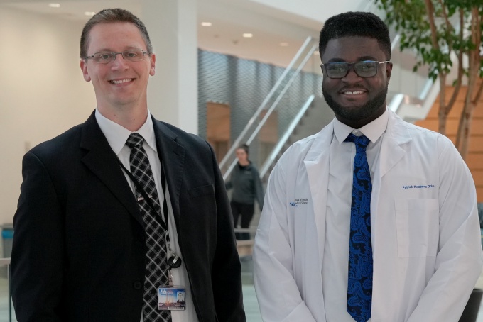 Dr. Grant with student Patrick Oduro. 
