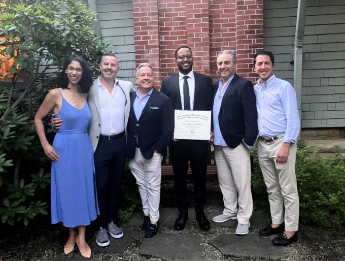 2023-2024 Fellow, Jaafar Elnagar, M.B, B.S with program faculty at the 2024 fellowship graduation dinner. 