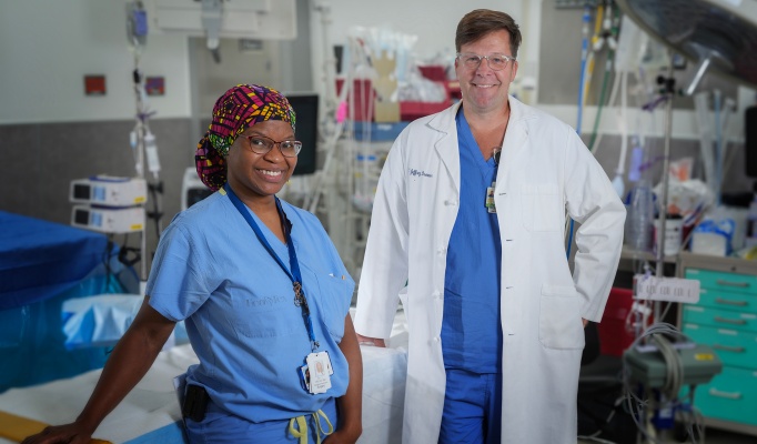 Mona Delva with Jeff Brewer in a clinical setting. 