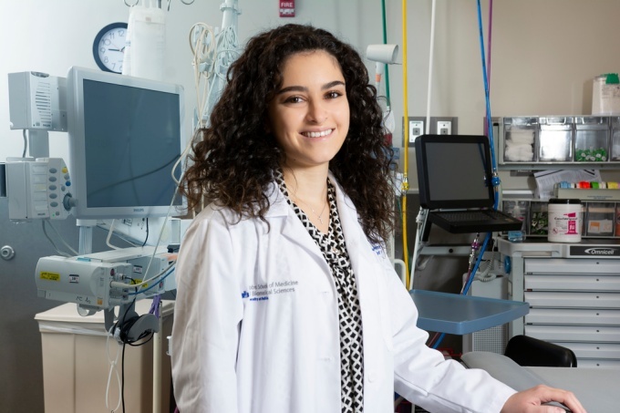 Kiana Saade, MD in a clinical setting. 
