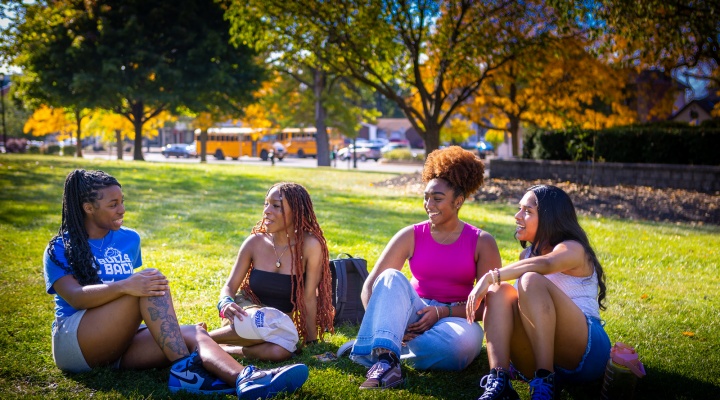 Students sitting outside.